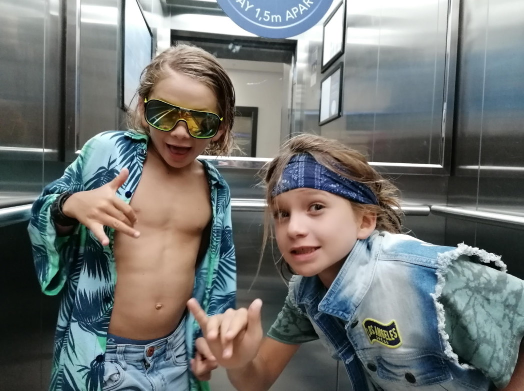 Butter's founding brothers posing in an elevator.